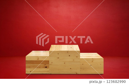 Wooden box, empty shelf in studio room, red background. 123682990