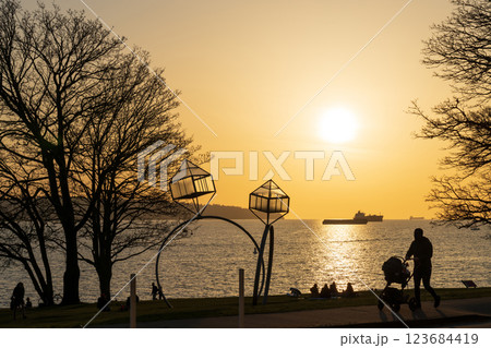 Vancouver, BC, Canada - March 30 2021 : Engagement sculpture at Sunset Beach, Vancouver City beautiful landscape. Vancouver, BC, Canada - March 30 2021 : Engagement sculpture at Sunset Beach, Vancouver City beautiful landscape. 123684419