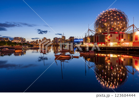Urban city night, Vancouver marina twilight panoramic view. Skyline and buildings lights reflection on False Creek water. British Columbia, Canada. Science World. 123684444