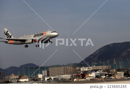 passenger jet land on Fukuoka airport. it is the main airport in Kyushu island 123685285
