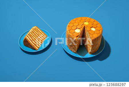 Medovik, honey layered cake, russian recipe, in bright light on a blue table Medovik, honey layered cake, russian recipe, in bright light on a blue table 123688297