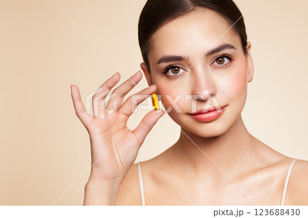 Beautiful Girl With Pill With Cod Liver Oil Omega-3 123688430