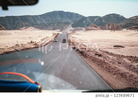 Dahab desert road in Egypt's Sinai Peninsula, view from the cabin of a jeep 123689671