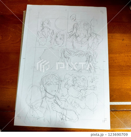 シャーペンでの下描き作業中の漫画原稿 漫画原稿制作中 シャーペンでの下描き作業中の漫画原稿 漫画原稿制作中 123690709