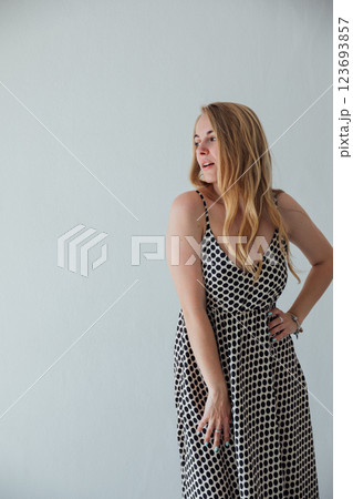 fashion blonde woman smiling in summer light dress 123693857