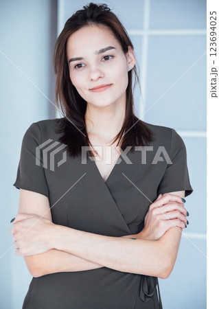 Beautiful Slim Woman in Green Summer Dress on White Background Beautiful Slim Woman in Green Summer Dress on White Background 123694025