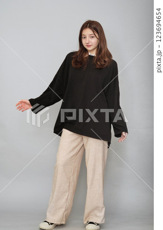 Thoughtful Teen in Customizable Hoodie, dressed in a high-quality black hoodie. The hoodie's plain backdrop is excellent for personalization, making it perfect for school brochures Thoughtful Teen in Customizable Hoodie, dressed in a high-quality black hoodie. The hoodie's plain backdrop is excellent for personalization, making it perfect for school brochures 123694654