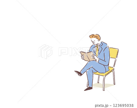 椅子に座って足を組み本を読むスーツ姿の男性 123695038