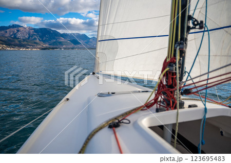 Sports yacht sailing in the Kotor Bay, Montenegro, representing adventure, freedom, and nautical exploration. 123695483