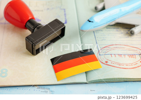 Germany passport with approved stamp on document for tourism to immigration at airport in country. 123699425