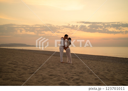 A Gentle Kiss At The Beach And Under The Sun  123701011