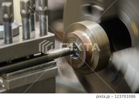 The lathe machine hole cutting by boring tool. The lathe machine hole cutting by boring tool. 123701086