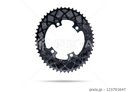 Black oval bicycle chainring against white isolated background, floating above the surface. Professional bicycle part. Black oval bicycle chainring against white isolated background, floating above the surface. Professional bicycle part. 123701647
