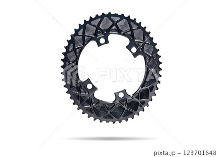 Black oval bicycle chainring against white isolated background, floating above the surface. Professional bicycle part. 123701648