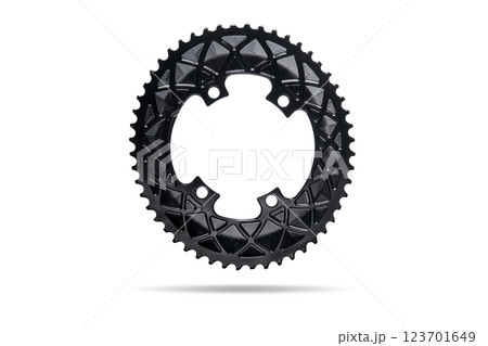 Black oval bicycle chainring against white isolated background, floating above the surface. Professional bicycle part. Black oval bicycle chainring against white isolated background, floating above the surface. Professional bicycle part. 123701649