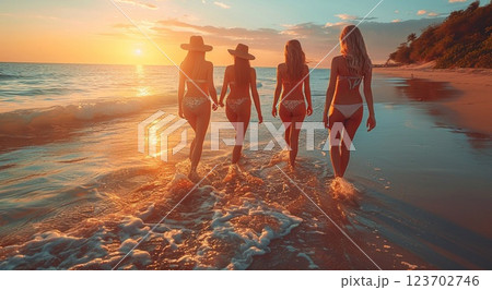 Rear view of young women walking on beach at sunset during summer holiday.Macro.AI Generative. 123702746