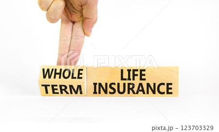 Term or whole life insurance symbol. Concept words Term life insurance or Whole life insurance on wooden blocks. Beautiful white background. Business term or whole life insurance concept. Copy space. Term or whole life insurance symbol. Concept words Term life insurance or Whole life insurance on wooden blocks. Beautiful white background. Business term or whole life insurance concept. Copy space. 123703329