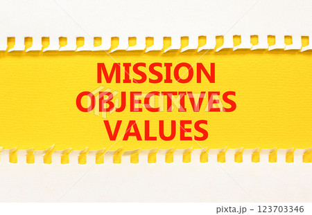 Mission objectives values symbol. Concept words Mission Objectives Values on beautiful yellow paper. Beautiful yellow white background. Business mission objectives values concept. Copy space. Mission objectives values symbol. Concept words Mission Objectives Values on beautiful yellow paper. Beautiful yellow white background. Business mission objectives values concept. Copy space. 123703346
