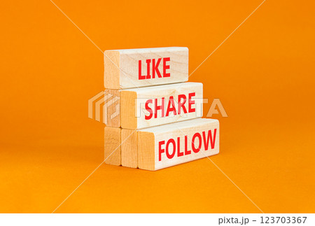 Like share follow symbol. Concept words Like Share Follow on beautiful wooden blocks. Beautiful orange table orange background. Business like share follow concept. Copy space. Like share follow symbol. Concept words Like Share Follow on beautiful wooden blocks. Beautiful orange table orange background. Business like share follow concept. Copy space. 123703367