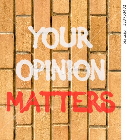 Your opinion matters symbol. Concept words Your opinion matters on beautiful brown brick wall. Beautiful brown brick wall background. Business your opinion matters concept. Copy space. 123703432