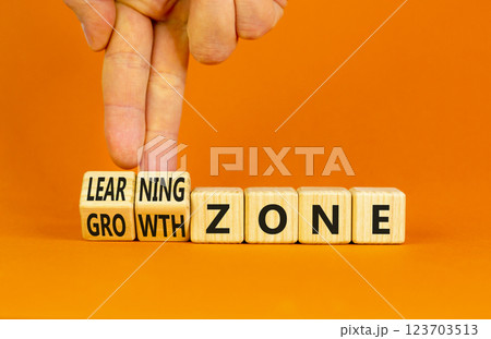 Learning or growth zone symbol. Concept words Learning zone Growth zone on wooden cubes. Beautiful orange table orange background. Psychologist hand. Business learning growth zone concept. Copy space. Learning or growth zone symbol. Concept words Learning zone Growth zone on wooden cubes. Beautiful orange table orange background. Psychologist hand. Business learning growth zone concept. Copy space. 123703513