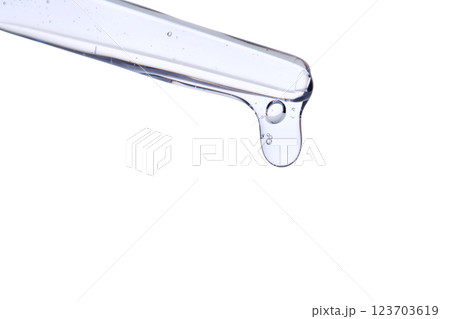 Pipette with delicate blue serum close-up. 123703619