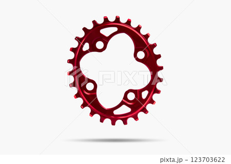 Red oval bicycle chainring against white isolated background, floating above the surface. Professional bicycle part. 123703622