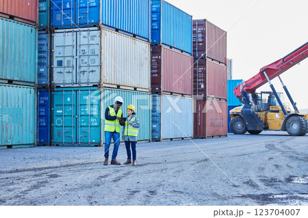 Delivery, logistics and leader coaching at a container supply chain warehouse outdoors for stock inspection. Forklift, woman and black man planning cargo, product and manufacturing shipping in Dallas 123704007