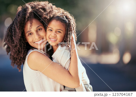 Black mother with girl child hug in a park with summer lens flare for love, care or growth development outdoor wellness. Happy natural mom bonding with kid in nature portrait together for mothers day Black mother with girl child hug in a park with summer lens flare for love, care or growth development outdoor wellness. Happy natural mom bonding with kid in nature portrait together for mothers day 123704167