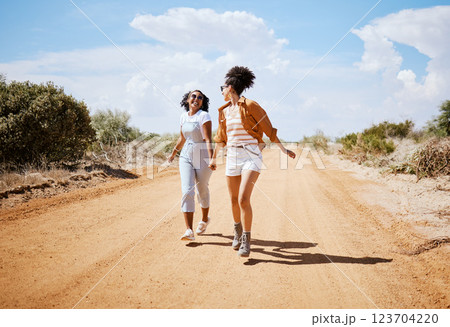 Energy, friends and travel with women walking on a dirt road, explore nature and freedom. Adventure, vacation and black women having fun and bonding in Mexico, carefree and cheerful and enjoying trip Energy, friends and travel with women walking on a dirt road, explore nature and freedom. Adventure, vacation and black women having fun and bonding in Mexico, carefree and cheerful and enjoying trip 123704220