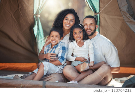 Happy family, children and camping in tent for fun, adventure and bonding with mom and dad on trip in nature. Portrait of woman, man and children together to relax on summer camp or vacation outdoors Happy family, children and camping in tent for fun, adventure and bonding with mom and dad on trip in nature. Portrait of woman, man and children together to relax on summer camp or vacation outdoors 123704232