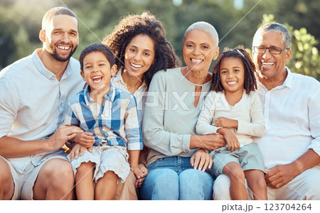 Big family portrait in a park with grandparents and children for summer, outdoor holiday and wellness. Happy grandmother, grandfather with mom, dad and kids in nature, bonding and bokeh lens flare Big family portrait in a park with grandparents and children for summer, outdoor holiday and wellness. Happy grandmother, grandfather with mom, dad and kids in nature, bonding and bokeh lens flare 123704264