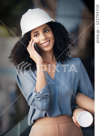 Architect, phone call and black woman talking on smartphone, holding blueprint with smile outside construction, architecture and engineering industry. Happy african female worker talking to contact Architect, phone call and black woman talking on smartphone, holding blueprint with smile outside construction, architecture and engineering industry. Happy african female worker talking to contact 123704310