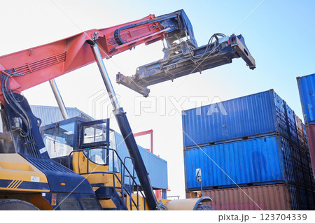 Crane, box container and delivery cargo shipping business company in manufacturing, shipping and distribution of stock. Industrial freight machine transport truck export supply chain courier package Crane, box container and delivery cargo shipping business company in manufacturing, shipping and distribution of stock. Industrial freight machine transport truck export supply chain courier package 123704339