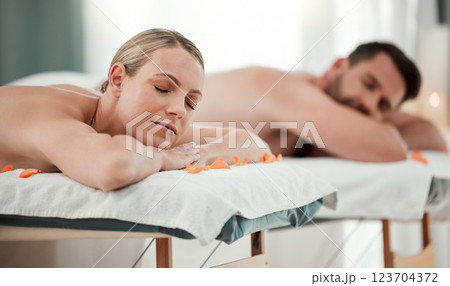 Massage, relax and wellness with a couple in a spa for treatment, health or body care while on a date. Luxury, beauty and romance with a man and woman on a bed in a clinic for rest and relaxation Massage, relax and wellness with a couple in a spa for treatment, health or body care while on a date. Luxury, beauty and romance with a man and woman on a bed in a clinic for rest and relaxation 123704372