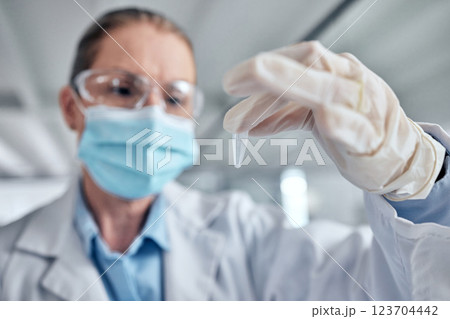 Doctor research in laboratory, future science test medicine and focus on chemical liquid vaccine. Woman scientist study experiment, medical covid healthcare education and futuristic scifi chemistry Doctor research in laboratory, future science test medicine and focus on chemical liquid vaccine. Woman scientist study experiment, medical covid healthcare education and futuristic scifi chemistry 123704442