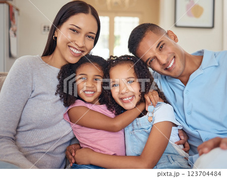Portrait, happy family and living room sofa hug, smile and bonding for love, happiness and joy together at home. Parents of mother, father and girl children or kids on lounge couch smiling at house 123704484