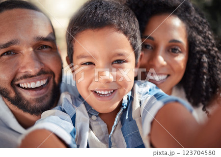 Happy, smile portrait of family taking selfie outdoors, having fun laughing and bonding. Love, happy family and caring parents enjoy free time with their playful son, laughing and showing affection Happy, smile portrait of family taking selfie outdoors, having fun laughing and bonding. Love, happy family and caring parents enjoy free time with their playful son, laughing and showing affection 123704580