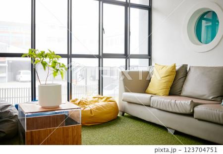 Room, interior and furniture with an empty space in a modern home or office during summer. Business, home and sofa in a luxury apartment for design, architecture or simplicity with a large window Room, interior and furniture with an empty space in a modern home or office during summer. Business, home and sofa in a luxury apartment for design, architecture or simplicity with a large window 123704751