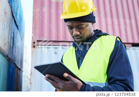 Digital tablet, logistics and black manager working on outdoor cargo freight site with shipping containers. African industrial man employee planning delivery, shipping and supply chain on mobile. 123704838