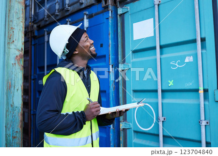 Warehouse, shipping and cargo checklist with happy manager smiling and checking stock at factory plant. Logistics, supply chain and management by black man excited with ecommerce delivery container 123704840