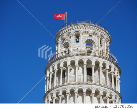Leaning Tower of Pisa with Pisa city flag on the top of it close up at the sky background Leaning Tower of Pisa with Pisa city flag on the top of it close up at the sky background 123705356
