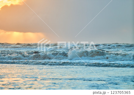 Sunset over north sea waves in Denmark 123705365