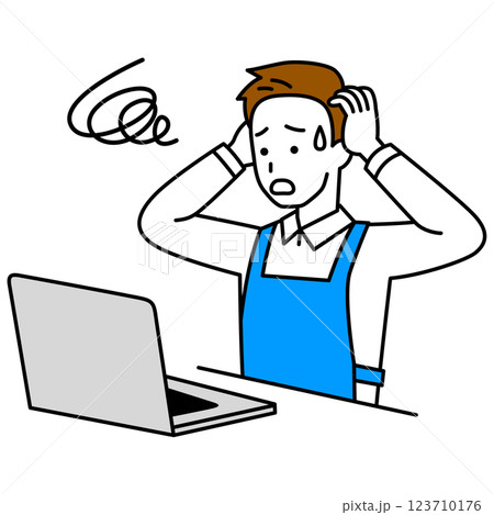 ノートパソコンでトラブルになるエプロン姿の男性 123710176