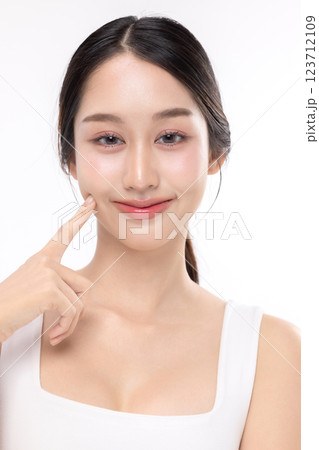 Close-up portrait of young Asian beautiful woman with K-beauty make up style and healthy and perfect skin isolated on white background for skincare commercial product advertising. 123712109