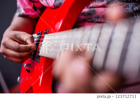 young guitar player performing in night club 123712711