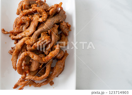 Sun-Dried Pork on white plate Sun-Dried Pork on white plate 123714903