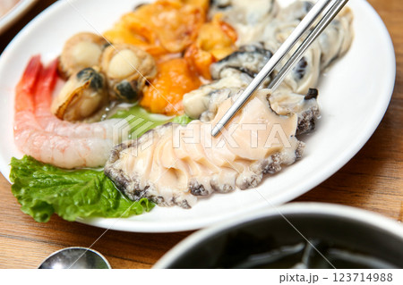 Korean seafood. Fresh abalone sashimi 123714988