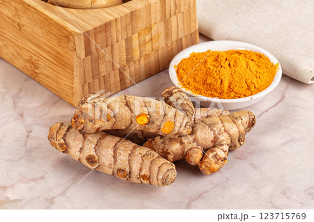 Fresh aroma tumeric roots heap 123715769