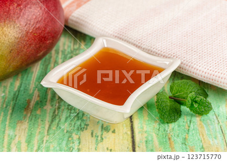 Sweet dessert orange mango puree Sweet dessert orange mango puree 123715770